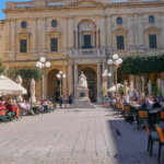 The National Library of Malta with a statue of Queen Victoria Valletta